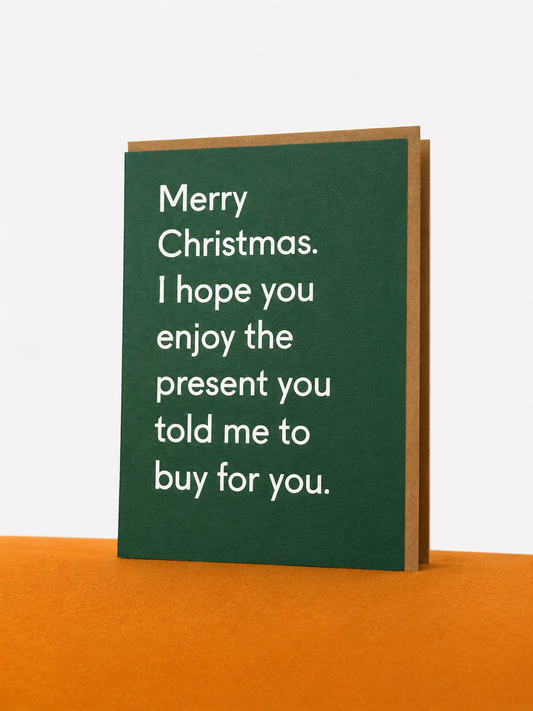 Kalėdinis atvirukas „I Hope You Enjoy The Present You Told Me To Buy For You“