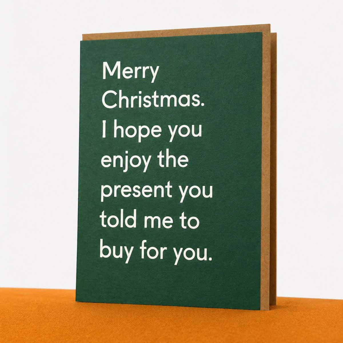 Kalėdinis atvirukas „I Hope You Enjoy The Present You Told Me To Buy For You“