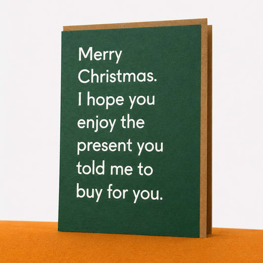 Kalėdinis atvirukas „I Hope You Enjoy The Present You Told Me To Buy For You“